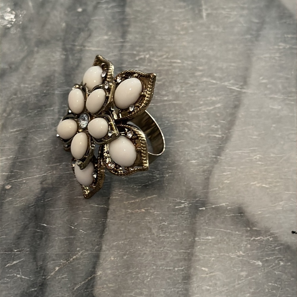 Gorgeous Floral Statement ring with gold tones and stone and jewel details